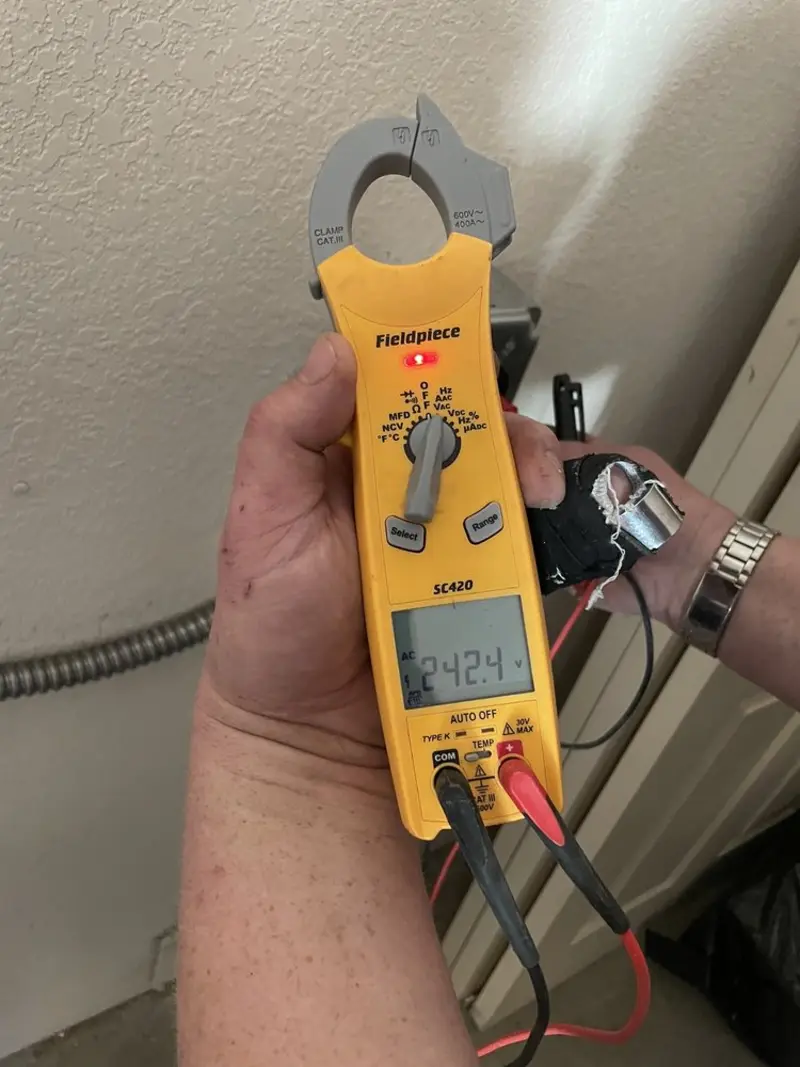 Voltage testing with clamp meter during Generator Installation in Mount Hope